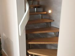 Treppe mit geschwungenem Geländer