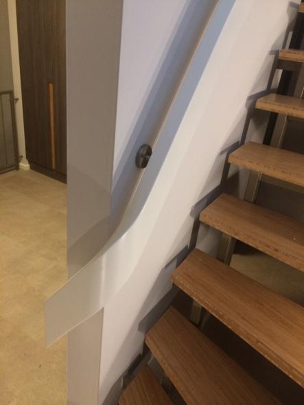 Treppe mit geschwungenem Geländer